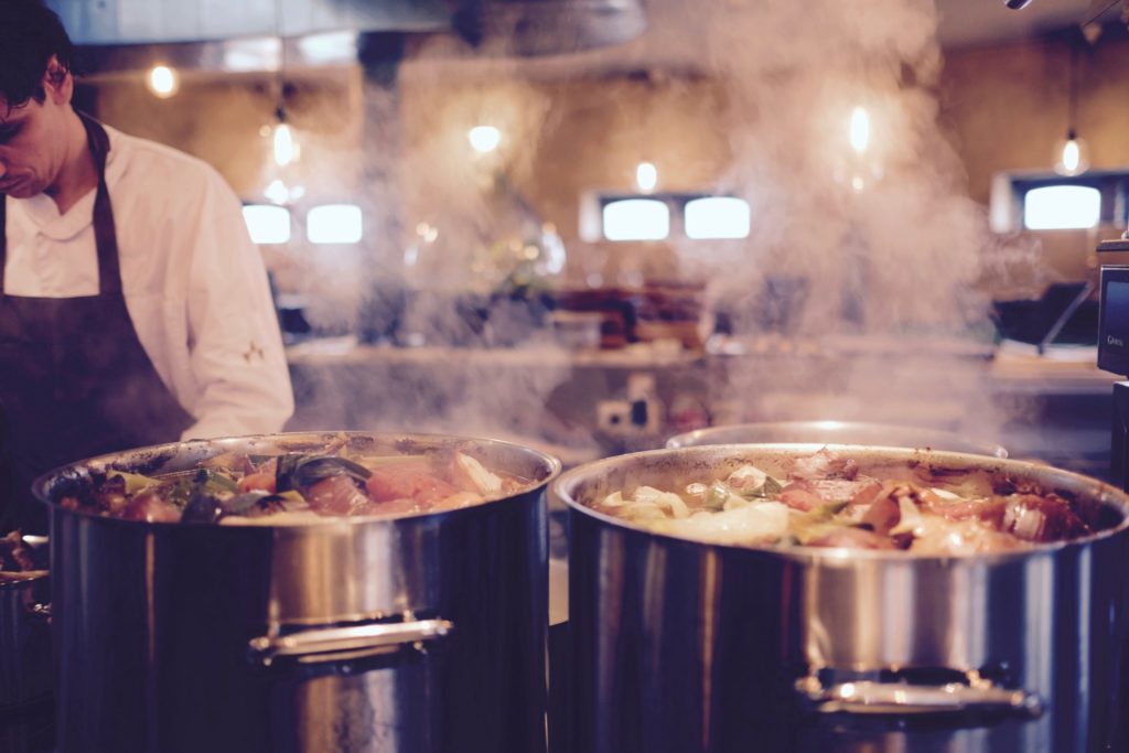 restaurant chef cooking in kitchen